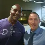 Dr. Osborne having dinner with the champ, Evander Holyfield